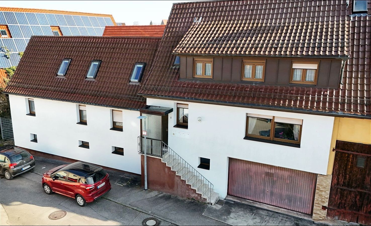 Vielseitiges 3-Familienhaus mit Nebengebäuden – Viel Potenzial für Kapitalanleger oder Handwerker 